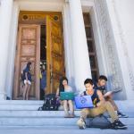 studnets sitting on steps at UC Berkeley