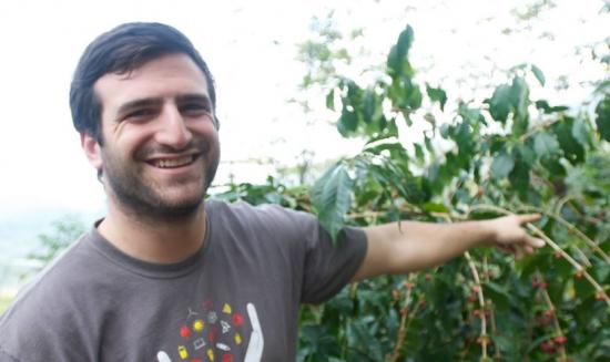 Ariel Chait with a coffee plant in Chiapas, Mexico
