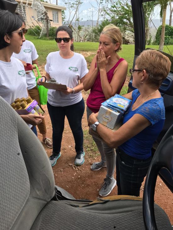 Members of the Puerto Rico Recovery Fund help deliver supplies to those in need.