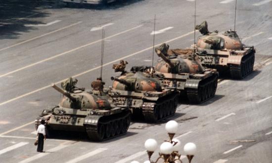  A Chinese man stands alone to block a line of tanks in Tiananmen Square, 1989. Photograph: Jeff Widener/AP