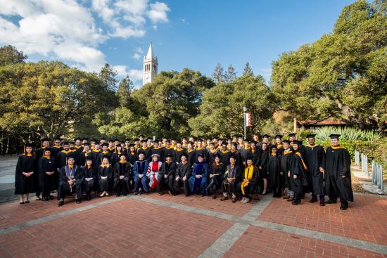 Group of graduates with faculty