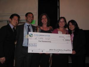 The WE CARE Solar team accepts the Social Impact Assessment prize