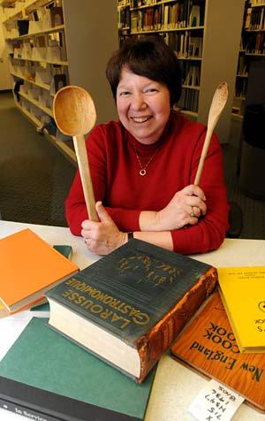Norma Kobzina at Berkeley’s Natural Resources Library, which includes the culinary collection. (Peg Skorpinski photo)