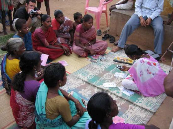 Field testing of a CAM application with an Indian microfinance group. The group staff is capturing records via mobile phone.